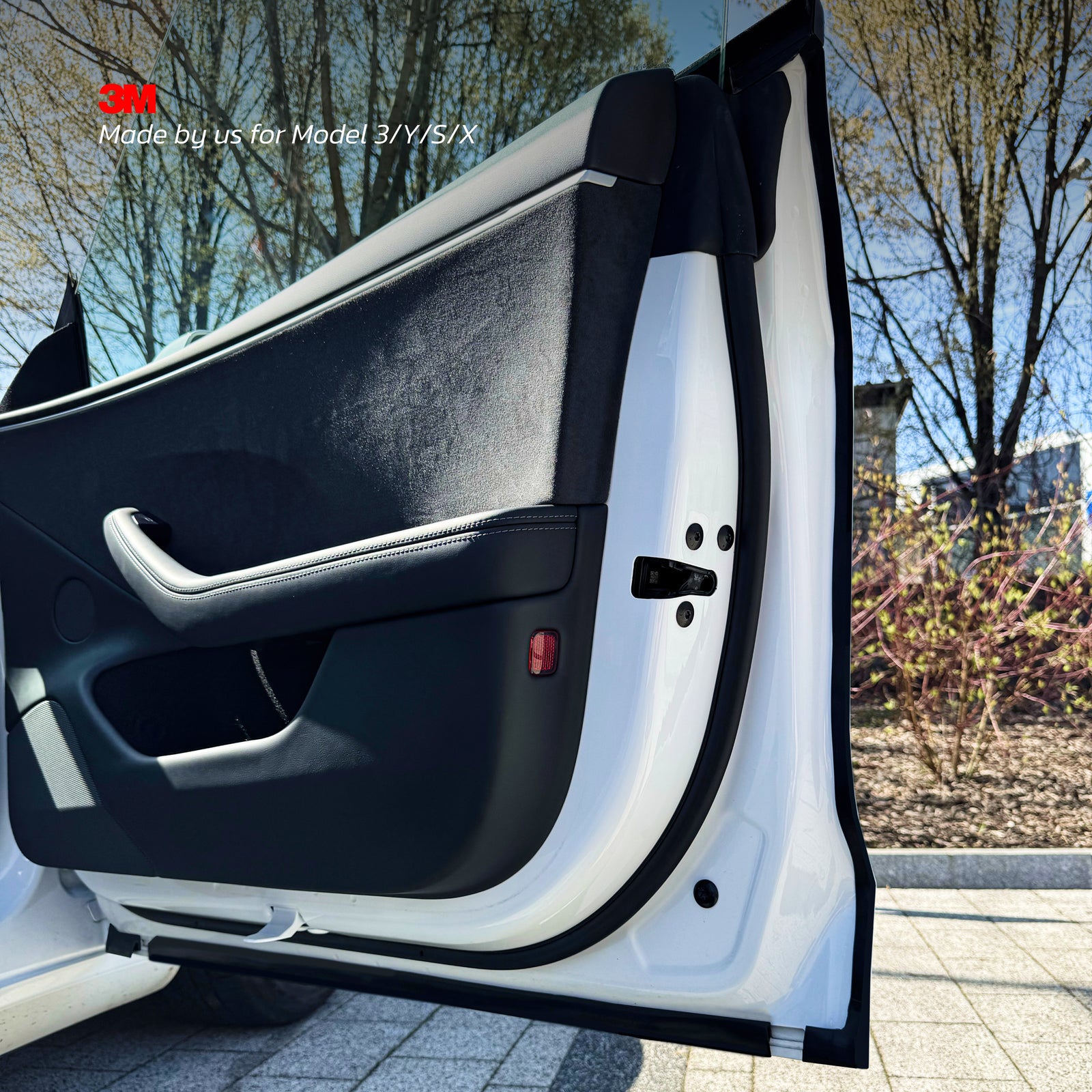 Open Model Y front door showing the seal line running around the door frame